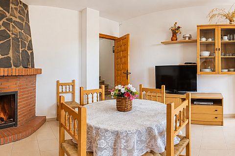 Esszimmer mit Kamin in Ferienhaus 4